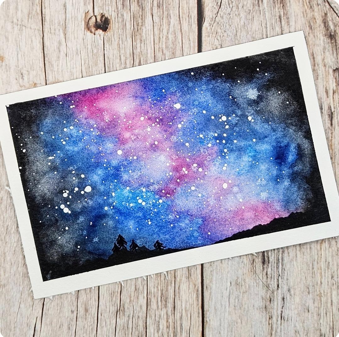 fond galaxie à l'aquarelle